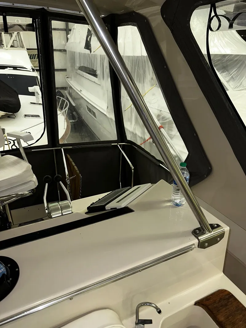 Slide: The Image of 1987 Sea Ray 460 Convertible interior with modern design and sleek finishes. - 47