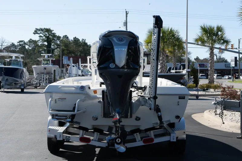 Slide: The Image of 2024 Skeeter SX 210 boat rear view with outboard motor on trailer. - 4