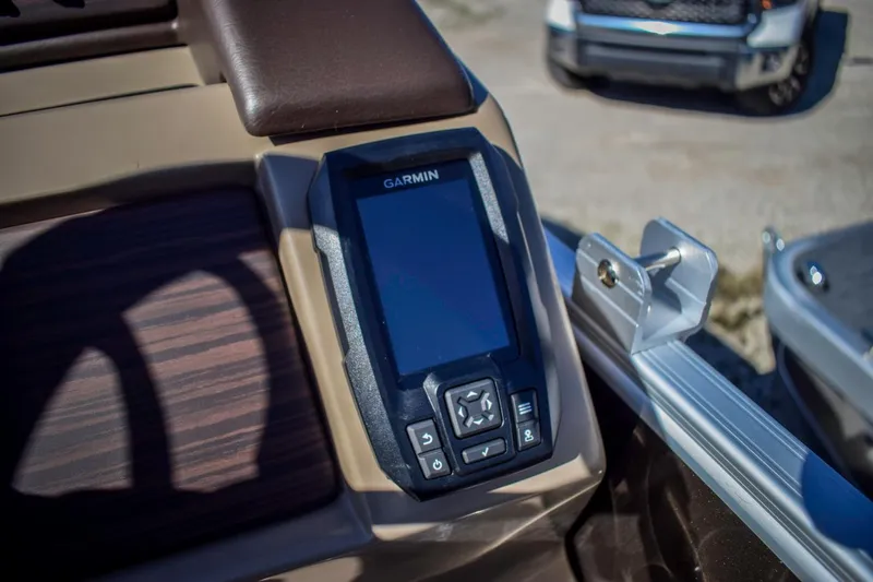 Slide: The Image of Garmin device on 2024 Bennington 22 LSB boat dashboard, close-up view. - 9