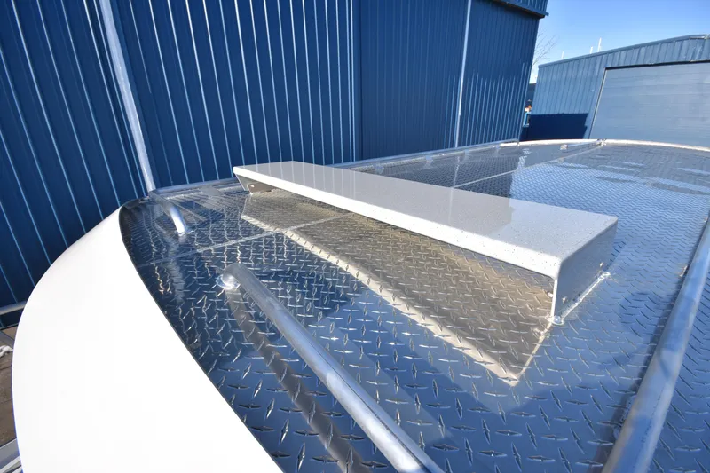 Slide: The Image of 2025 Weldcraft 280 Cuddy King T250XCB boat deck with diamond plate finish. - 14