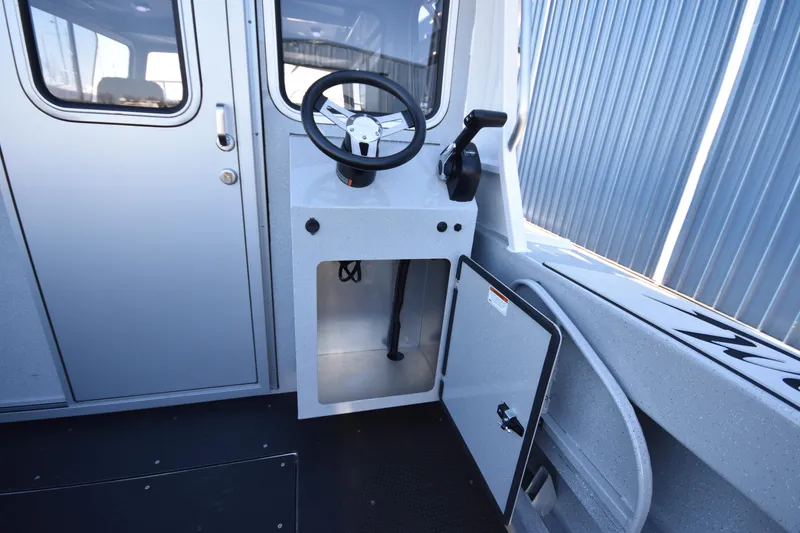 Slide: The Image of 2025 Weldcraft 280 Cuddy King T250XCB boat interior steering console. - 17