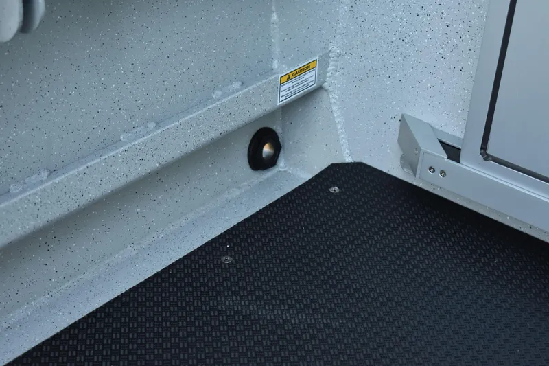 Slide: The Image of 2025 Weldcraft 280 Cuddy King T250XCB interior detail showing flooring and wall. - 28