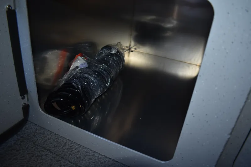 Slide: The Image of Storage compartment in 2025 Weldcraft 280 Cuddy King T250XCB boat. - 47