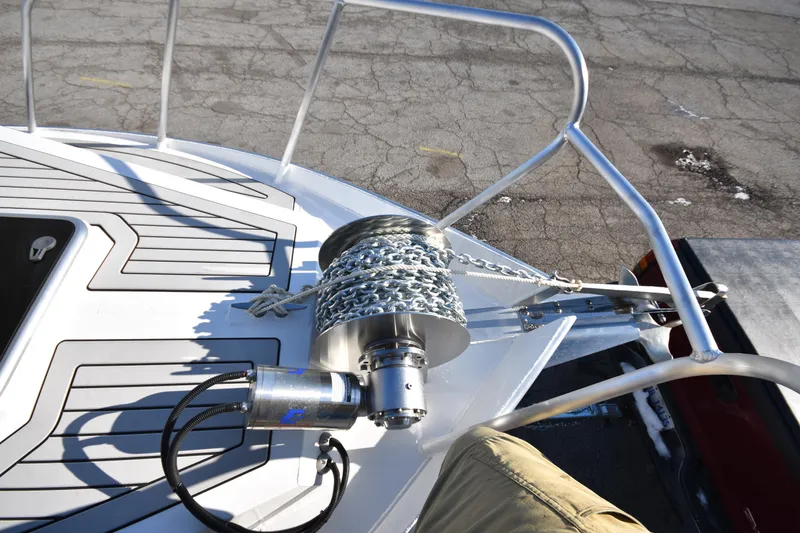 Slide: The Image of 2025 Weldcraft 280 Cuddy King T250XCB anchor winch and chain on deck. - 5