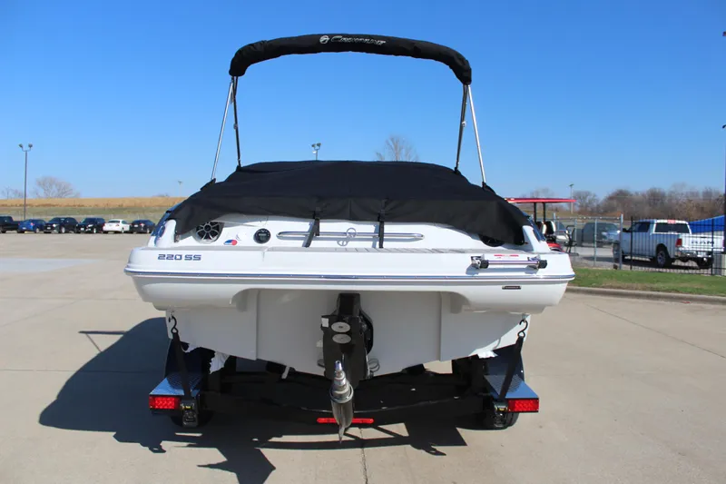 Slide: The Image of 2024 Crownline 220 SS boat rear view on trailer. - 14