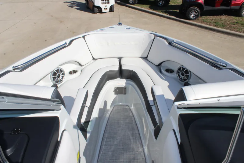 Slide: The Image of 2024 Crownline 220 SS boat interior with white and black seating. - 4