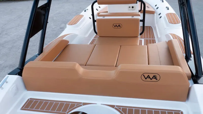 Slide: The Image of Aqvaboats Luxrib 22, 2025 model, featuring luxurious tan seating and sleek design. - 10