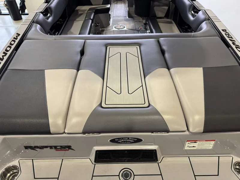 Slide: The Image of 2021 Moomba Max boat interior with gray upholstery. - 10