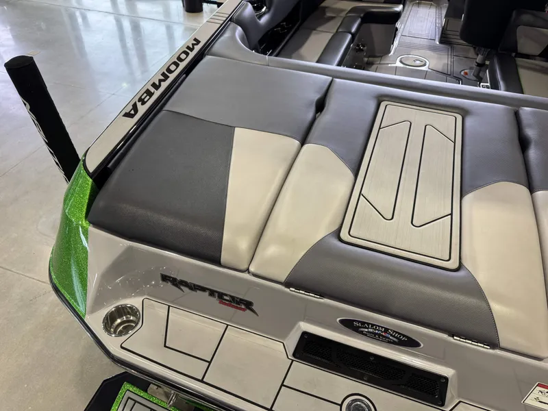 Slide: The Image of 2021 Moomba Max boat interior with gray upholstery. - 12