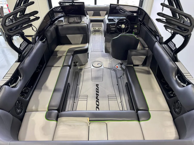 Slide: The Image of Interior of a 2021 Moomba Max boat with stylish design. - 13