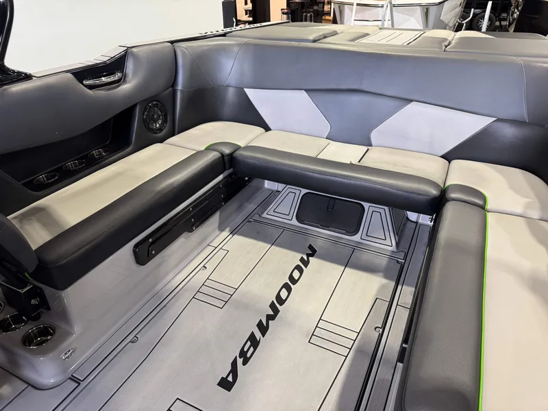 Slide: The Image of Interior of a 2021 Moomba Max boat with gray seating. - 15