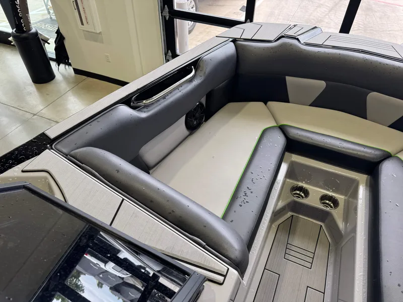 Slide: The Image of Interior of a 2021 Moomba Max boat with gray upholstery. - 19