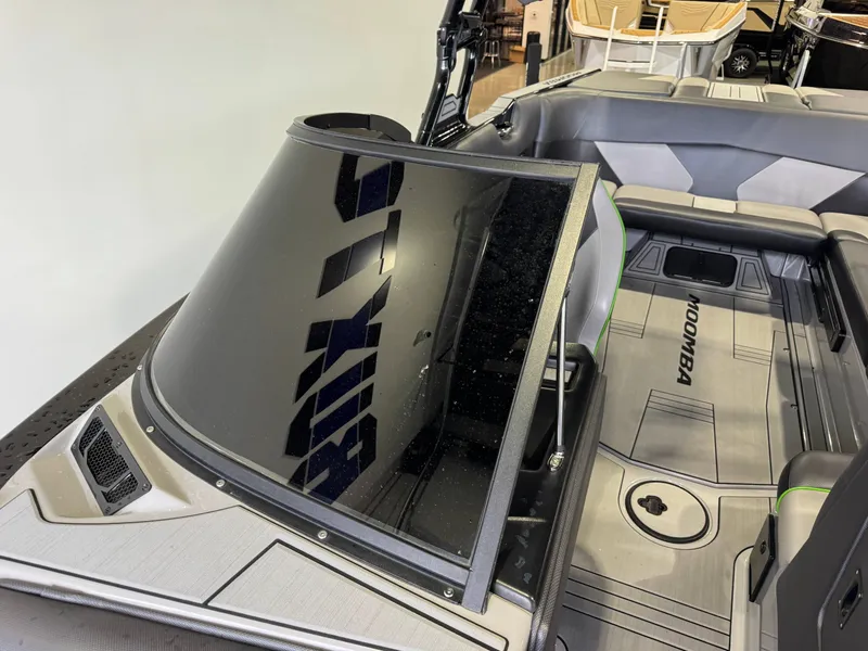 Slide: The Image of Interior of a 2021 Moomba Max boat with gray seating. - 20