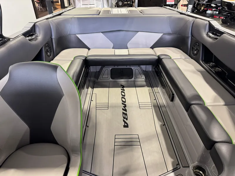 Slide: The Image of Interior of a 2021 Moomba Max boat with gray leather seating. - 22