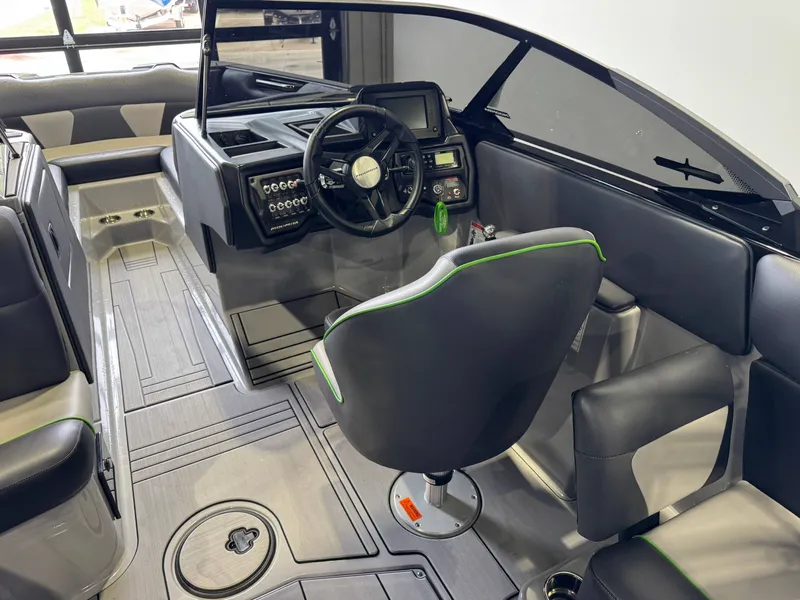 Slide: The Image of Interior of a 2021 Moomba Max boat with modern cockpit. - 24