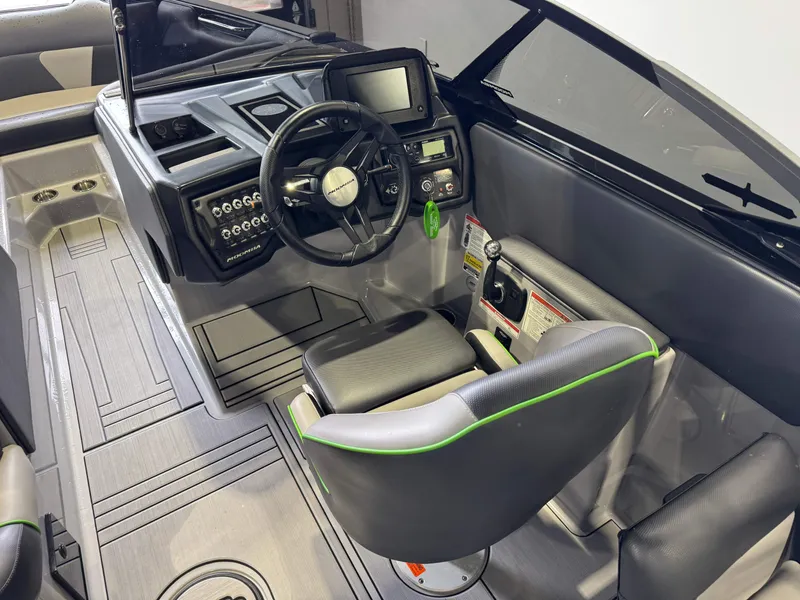 Slide: The Image of Interior of a 2021 Moomba Max boat with modern helm. - 25