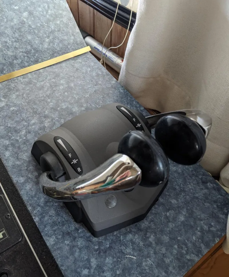 Slide: The Image of Throttle controls on a 2001 Monticello River Yacht. - 51