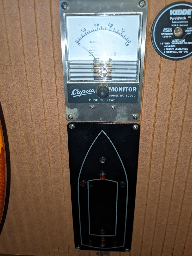 Slide: The Image of 2001 Monticello River Yacht gauge panel with Capacitance Monitor and Kidde PyroWatch. - 55