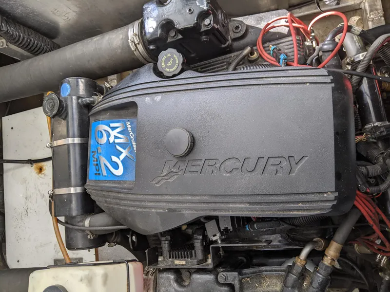 Slide: The Image of Mercury engine in a 2001 Monticello River Yacht. - 57