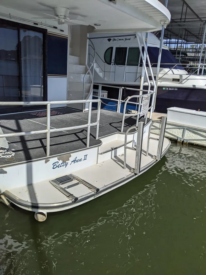 Slide: The Image of 2001 Monticello River Yacht docked, named Betty Ann II. - 76