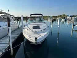 Slide: The Image of 2000 Chaparral 240 SIGNATURE boat docked in a marina. - 4