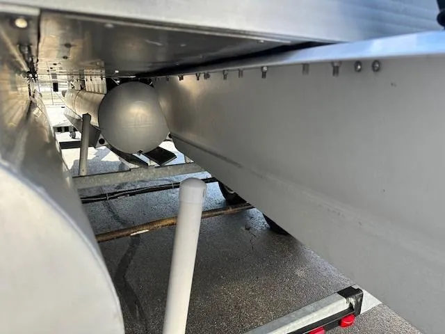 Slide: The Image of Underside view of a 2018 Lexington 325 boat trailer. - 7