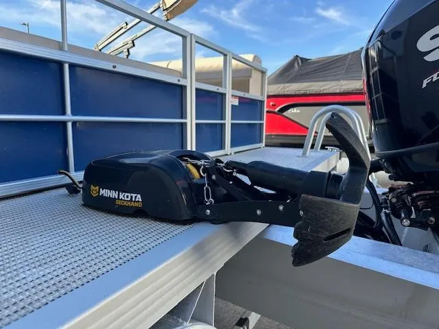 Slide: The Image of Minn Kota trolling motor on a 2018 Lexington 325 boat deck. - 8
