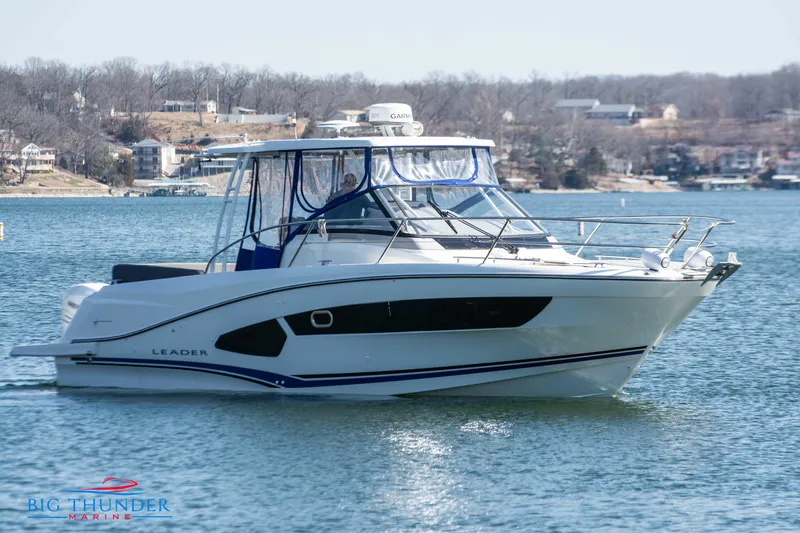 Slide: The Image of 2020 Jeanneau Leader 10.5 boat on a lake by Big Thunder Marine. - 13