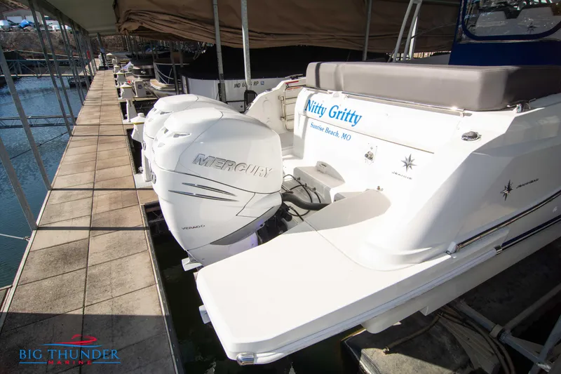 Slide: The Image of Jeanneau Leader 10.5 2020 boat docked with twin Mercury outboard engines. - 25