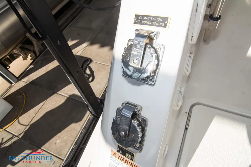 Slide: The Image of Close-up of Jeanneau Leader 10.5 2020 boat's air conditioning and power outlets. - 27