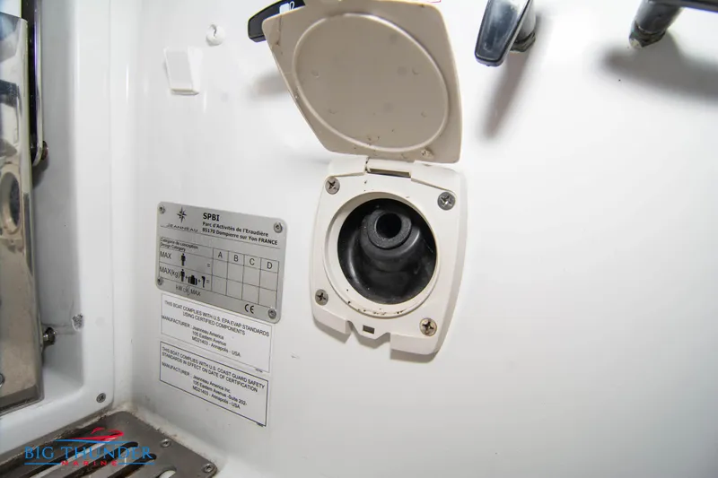 Slide: The Image of Jeanneau Leader 10.5 2020 boat fuel inlet with open cap and safety instructions. - 37