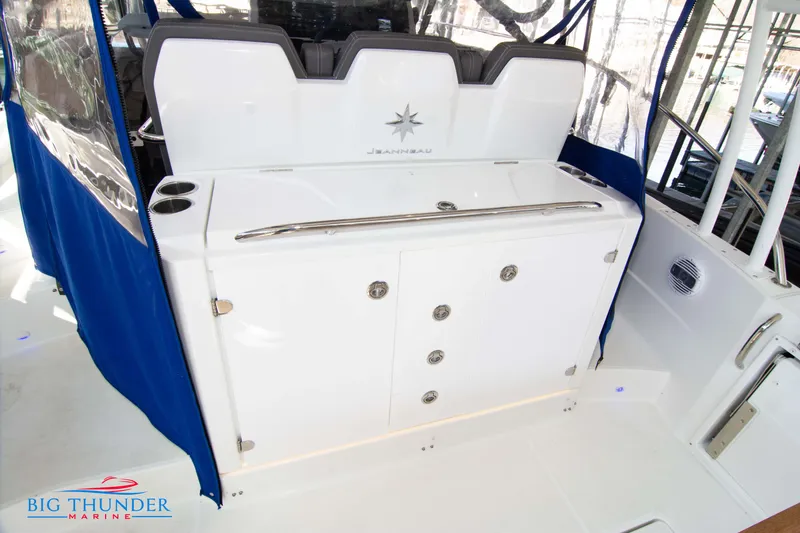 Slide: The Image of 2020 Jeanneau Leader 10.5 boat interior with storage compartments. - 42