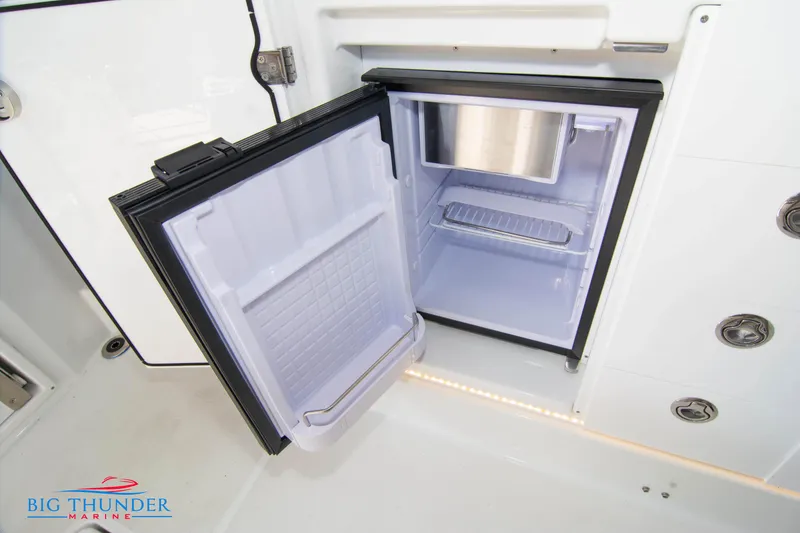 Slide: The Image of Open refrigerator on Jeanneau Leader 10.5 boat, 2020 model, by Big Thunder Marine. - 44