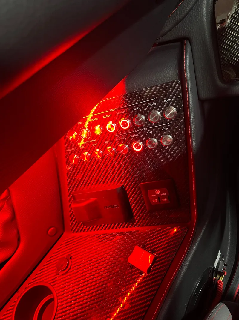 Slide: The Image of 2023 MTI 390XR control panel with red LED lighting. - 27