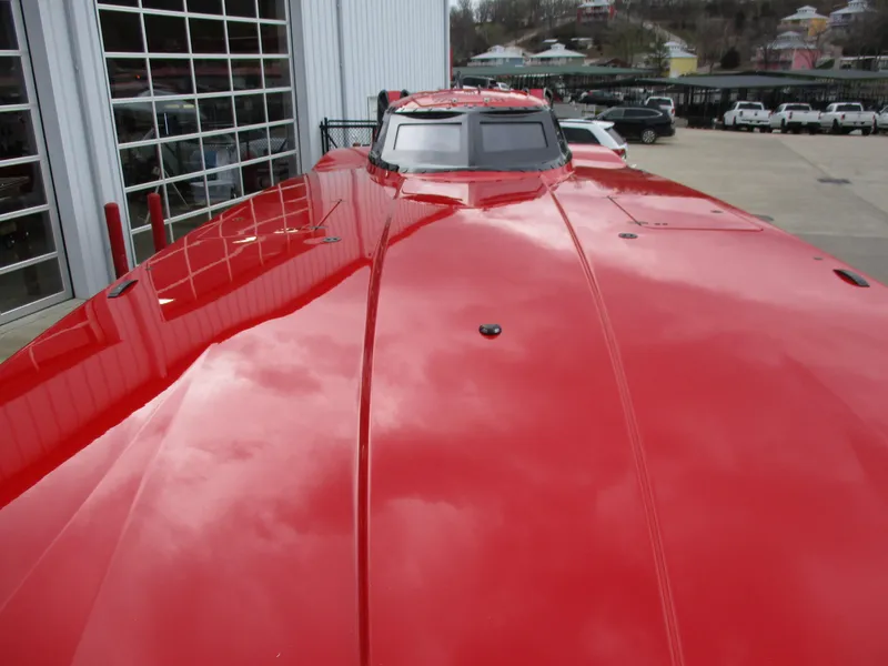 Slide: The Image of 2023 MTI 390XR red powerboat exterior view. - 8