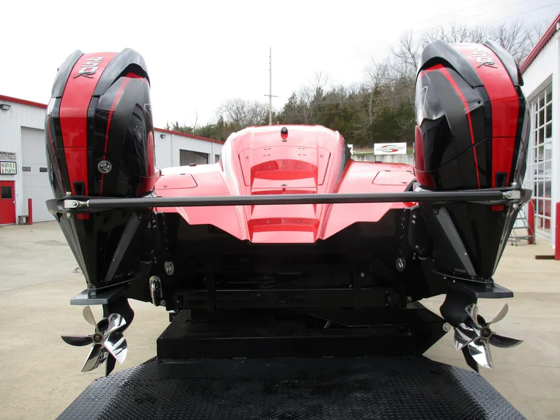 Slide: The Image of 2023 MTI 390XR powerboat with dual outboard engines, rear view. - 9
