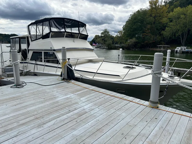 The Image of 1987 Viking Boats 44 Motor Yacht docked at a marina. - 1