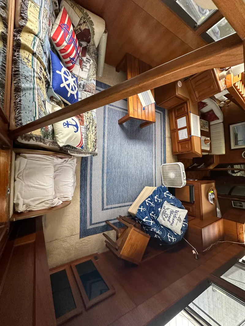 Slide: The Image of Interior of 1987 Viking Boats 44 Motor Yacht with nautical-themed decor. - 10