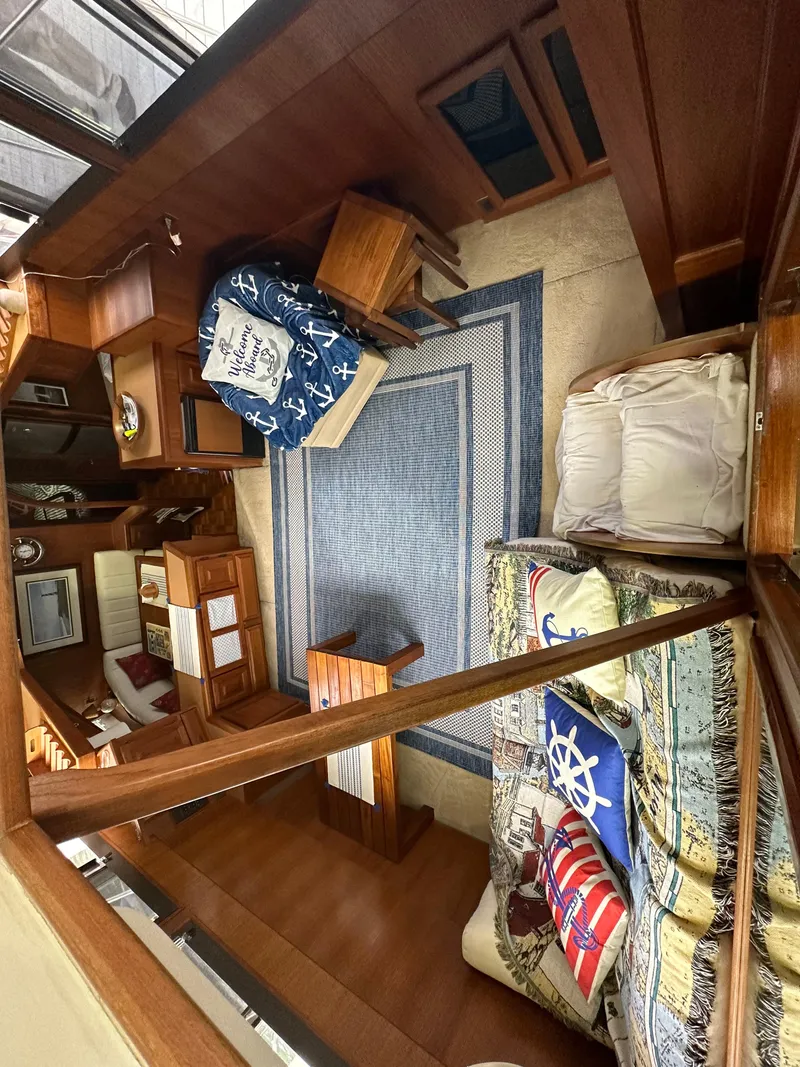 Slide: The Image of Interior of 1987 Viking Boats 44 Motor Yacht with nautical-themed decor. - 12