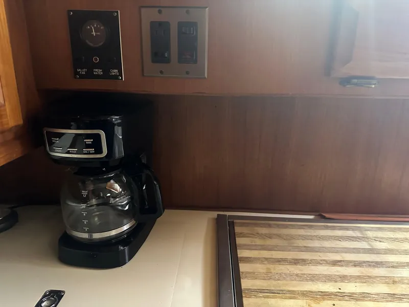 Slide: The Image of Coffee maker in the kitchen of a 1987 Viking Boats 44 Motor Yacht. - 19