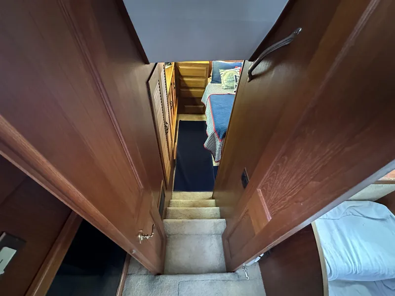 Slide: The Image of 1987 Viking Boats 44 Motor Yacht interior stairs leading to cabin - 29