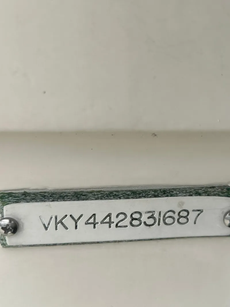 Slide: The Image of VIN plate of a 1987 Viking Boats 44 Motor Yacht. - 4