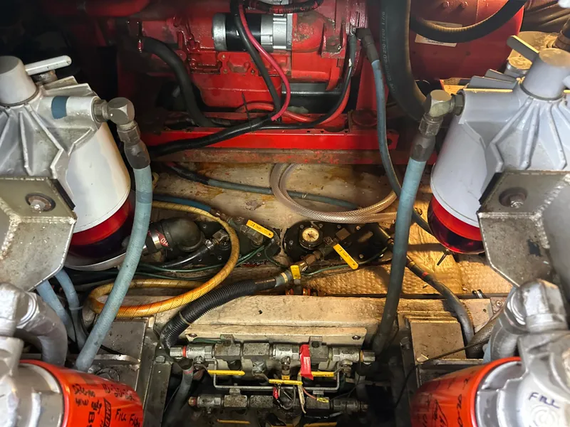 Slide: The Image of Engine room of a 1987 Viking Boats 44 Motor Yacht with visible components. - 49