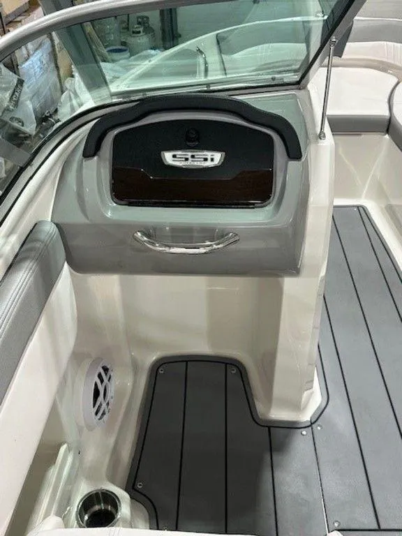 Slide: The Image of 2021 Chaparral 19 SSi boat interior with seating and storage. - 6