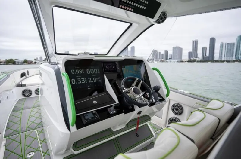 Slide: The Image of Interior of 2024 Deep Impact 399 Sport boat with modern controls. - 18