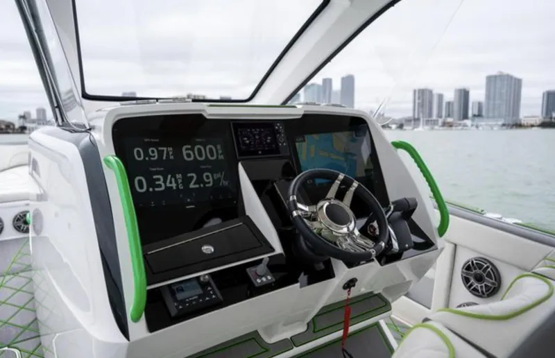 Slide: The Image of 2024 Deep Impact 399 Sport cockpit with modern controls. - 19