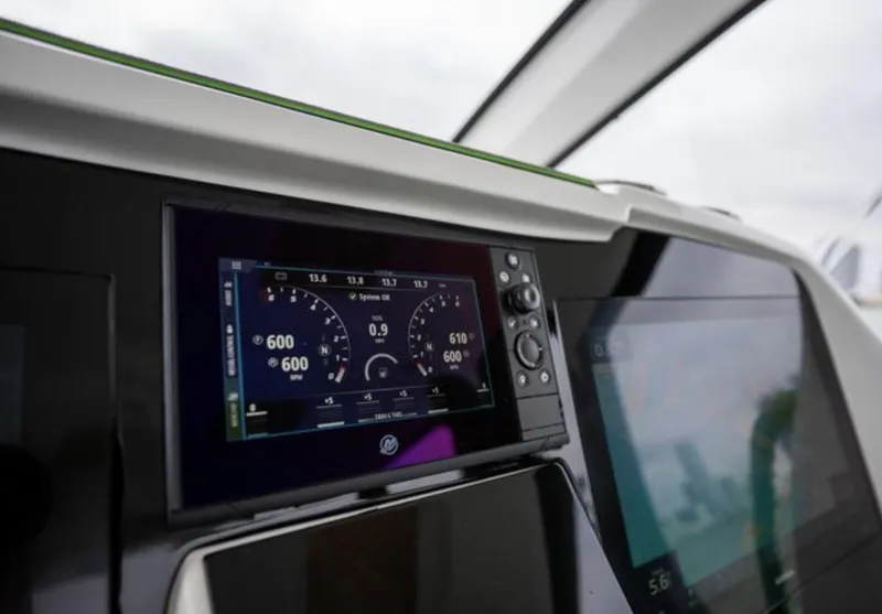 Slide: The Image of Dashboard of the 2024 Deep Impact 399 Sport boat. - 20