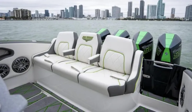 Slide: The Image of 2024 Deep Impact 399 Sport boat with luxurious seating and engines. - 28