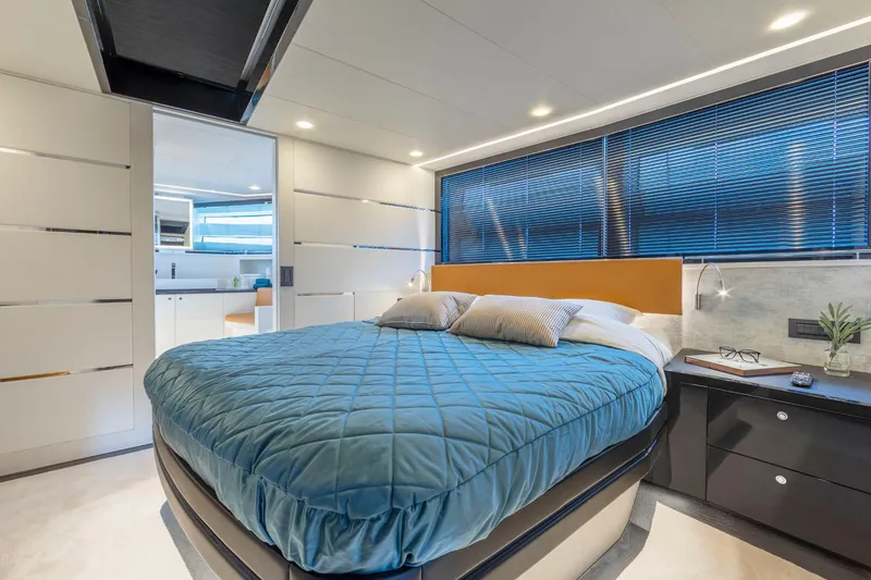 Slide: The Image of Luxurious bedroom in the 2025 Van der Valk BeachClub 660 Flybridge yacht. - 15