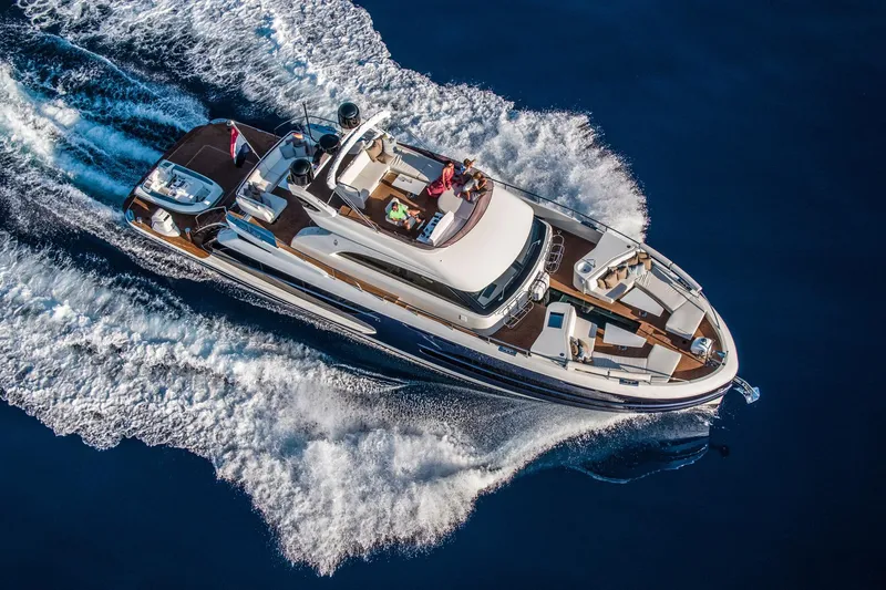 Slide: The Image of Aerial view of 2025 Van der Valk BeachClub 660 Flybridge yacht cruising on the ocean. - 3